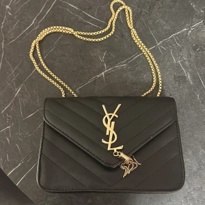 YSL väska  - Fin väska helt oanvänd