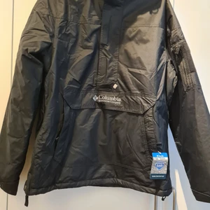 Columbia  - Oanvänd Columbia jacka 