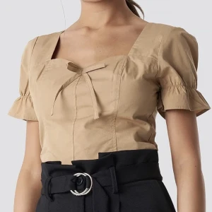 Puffy shoulder top - Jättefin beige topp, använd endast 2ggr. Mycket bra skick.