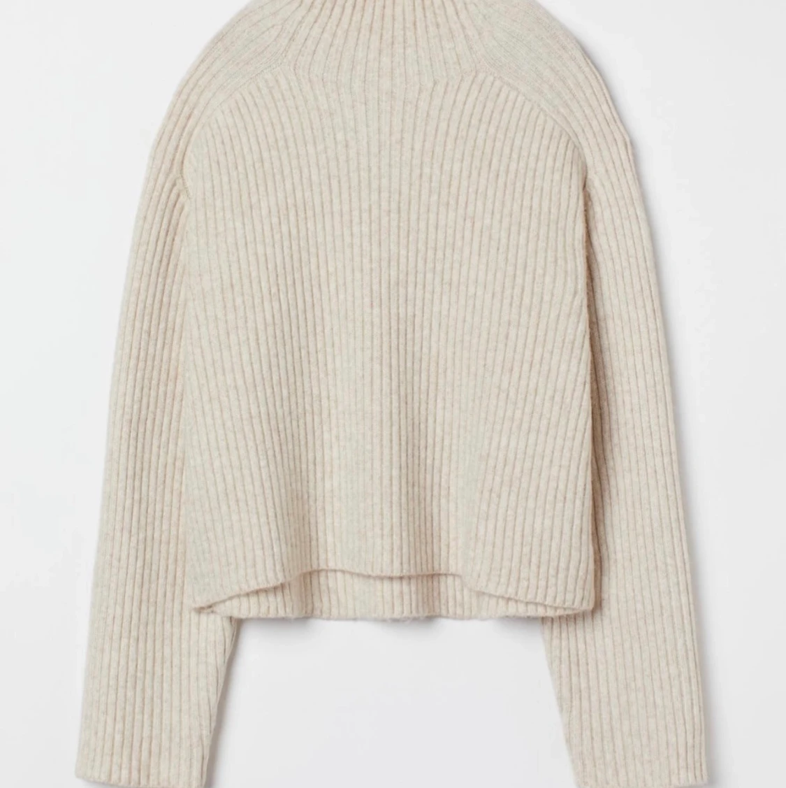 Ribbstickad polotröja från H&M - storlek L