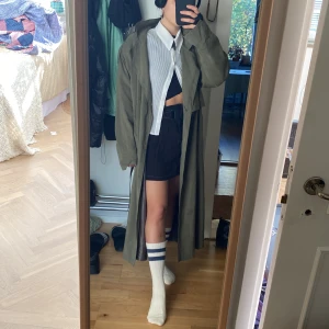 olive trench coat  - trench coat from the 80s with shoulder pads, from NY. 