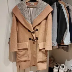 Coat is 100% woolen, in good condition. Suits best for cold weather. Medium length and oversized. If you prefer less oversized fit, it can be seemed as L/XL
