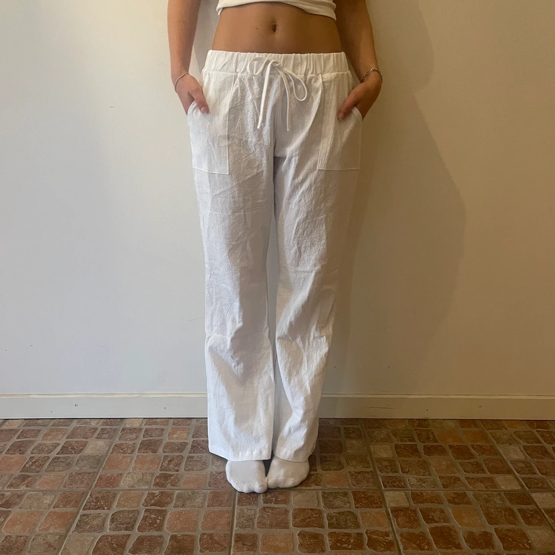 Vita lågmidjade linnebyxor - 90