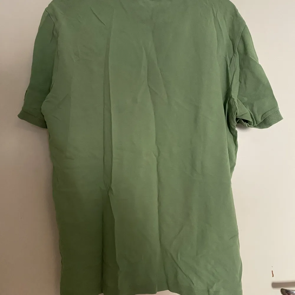 grön pickétröja från kappa💚storlek L💚rak modell💚. Skjortor.