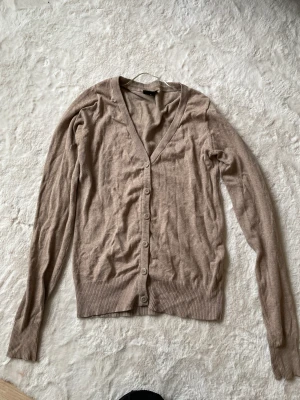 Beige kofta  - Lång modell, nästan oversize 