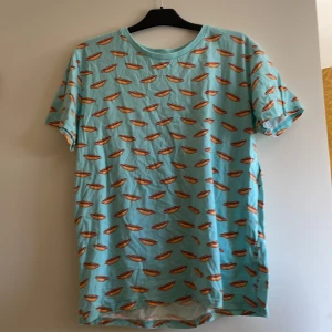 T-shirt  - Aldrig använd, med korvtryck, storlek XL, märke Biltema 