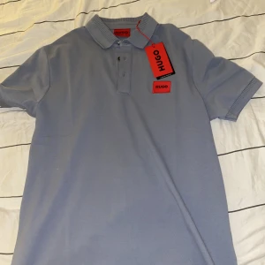 boss piké - Storlek S  helt ny 