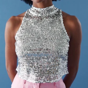 Glittertopp - Glittertopp Köparen står för frakten.