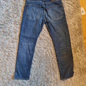 Levi's 502 - Som nya Levi's 502 jeans, tapered fit., Storlek 30/30. Säljes då de inte passar. Kan fraktas eller mötas upp. Flertal andra jeans finns även i min profil!