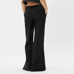 Kostymbyxor - Populära Kostymbyxor midwaist med slits . I nyskick 