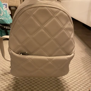 Ryggsäck  - Ryggsäck från Stradivarius. Helt ny/oanvänd.