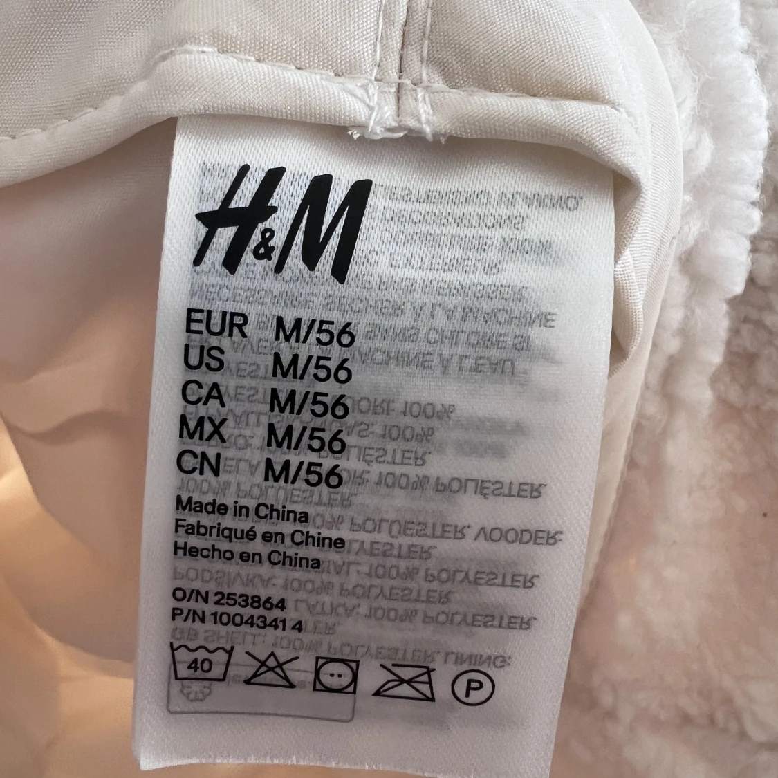 Buckethat mössa i fårskinnsimitation - 90