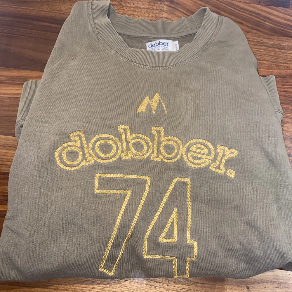 Olivgrön Dobber tröja MAN , storlek XL. . Hoodies.