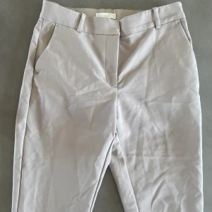 Hm - Beiga byxor storlek 38
