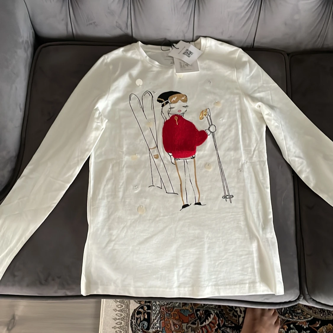 en Långärmad tröja storlek 146/152