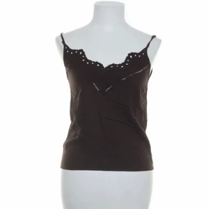 linne - Brunt linne som jag köpte på sellpy, det var tyvärr lite litet för min smak så jag har aldrig använt den. Den har gysterbata band!