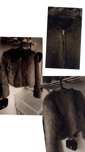 Pälsjacka - En snygg pälsjacka (ej äkta) i grå färg. Använd fåtal gånger och är i ett helt skick, nyskick. Helt och fin