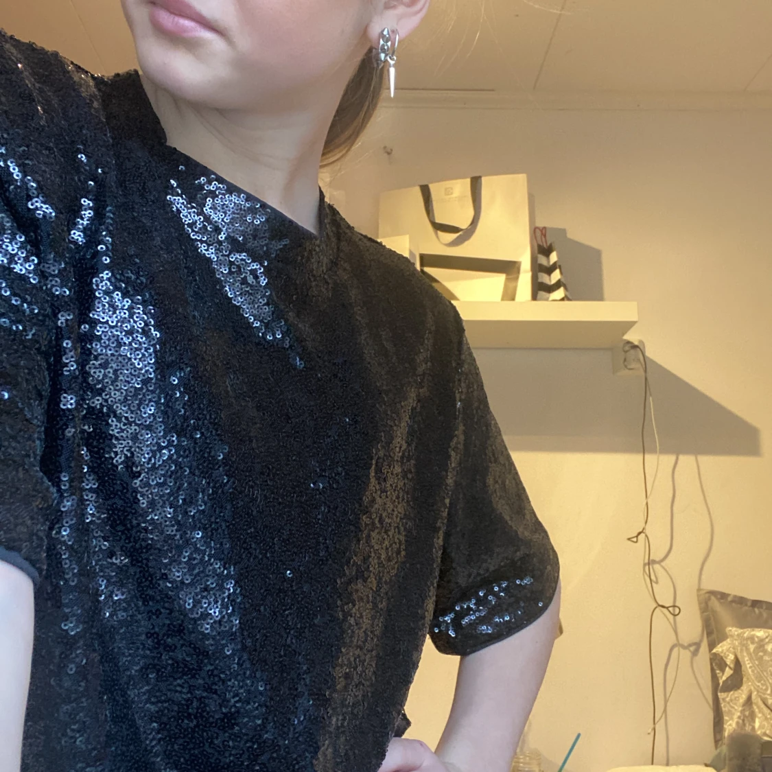 Svartglittrig topp från hm