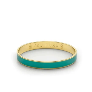  - Fint turkos/guldigt armband från Skultuna. Knappt använt och i fint skick. Frakt ingår!