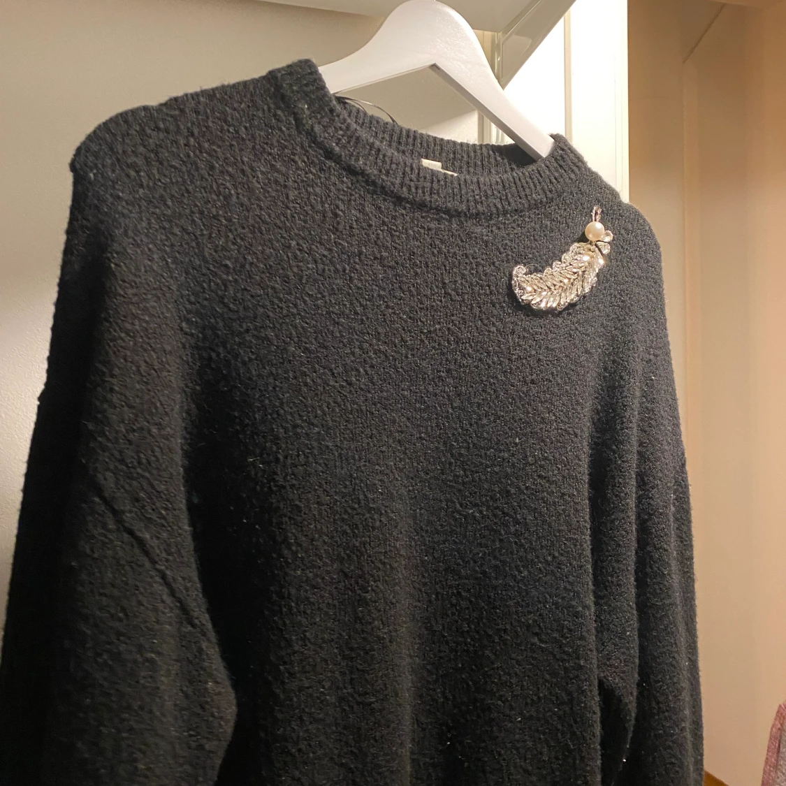 Svart stickad tröja