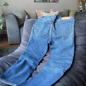 Discontinued Log from Acne Studios in the Mid Blue colorway. Great condition, barely used. Slightly cropped with a mid-high waist 