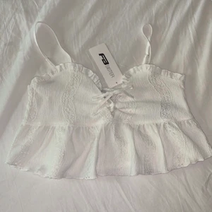 Sommar topp Strl M - Helt ny och har aldrig använt!  Storlek M men passar S också  Är köpt på New Yoker Ny pris är 95 kr  