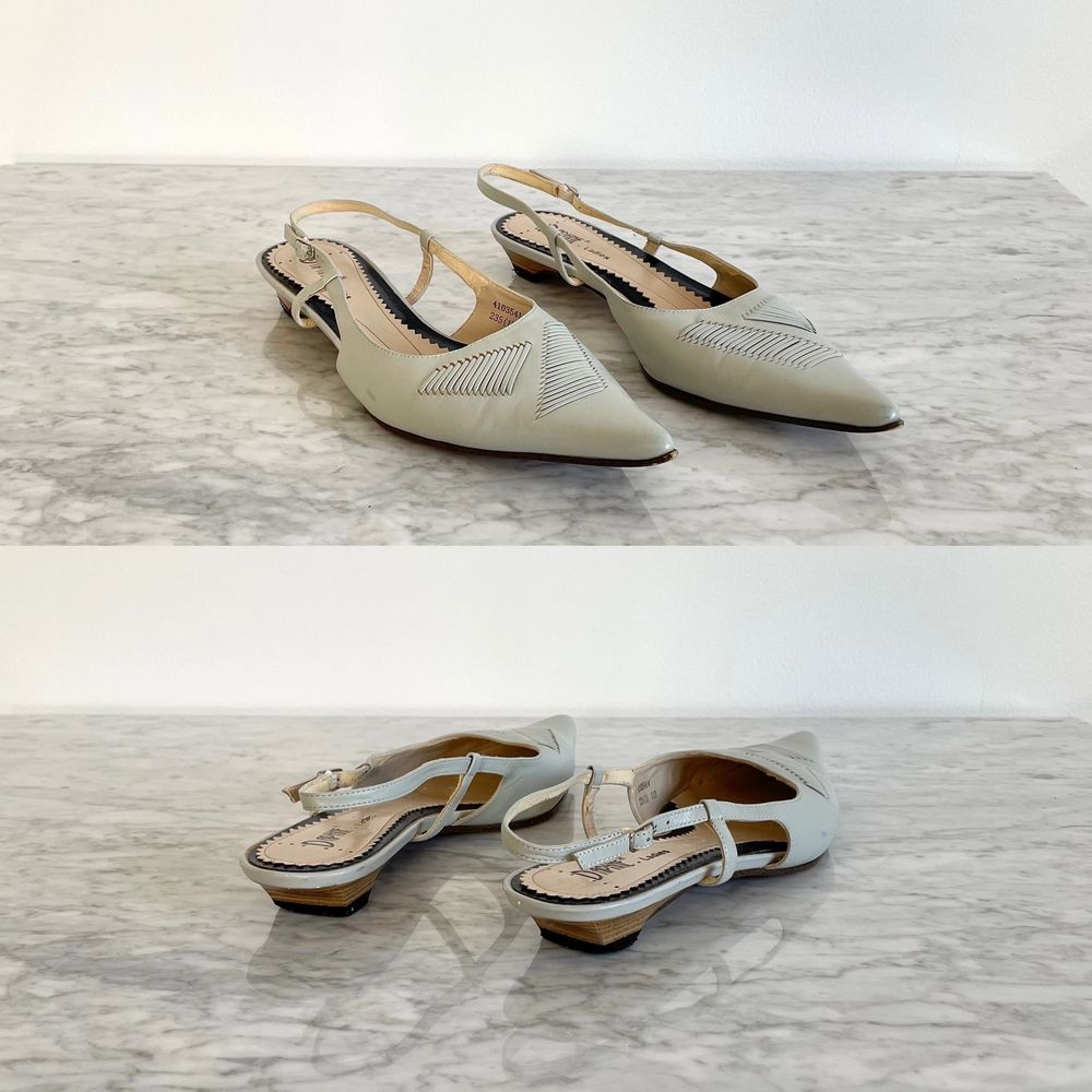 Real leather pointed tiny heel slingbacks in baby blue. Few tiny scratches and marks here and there, the faux leather lining layer is peeling, see the pictures. Label missing, but they fit perfectly on the model who wears size 36. No returns.. Skor.