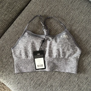 ICIW Sportbh - Grå sportbh i storlek L  För stor för mig därav jag säljer!  Lappen sitter kvar Nypris 349kr 