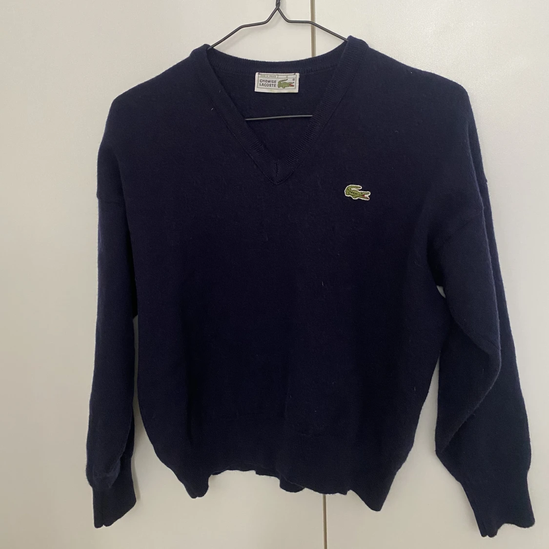 Stickad Lacoste tröja