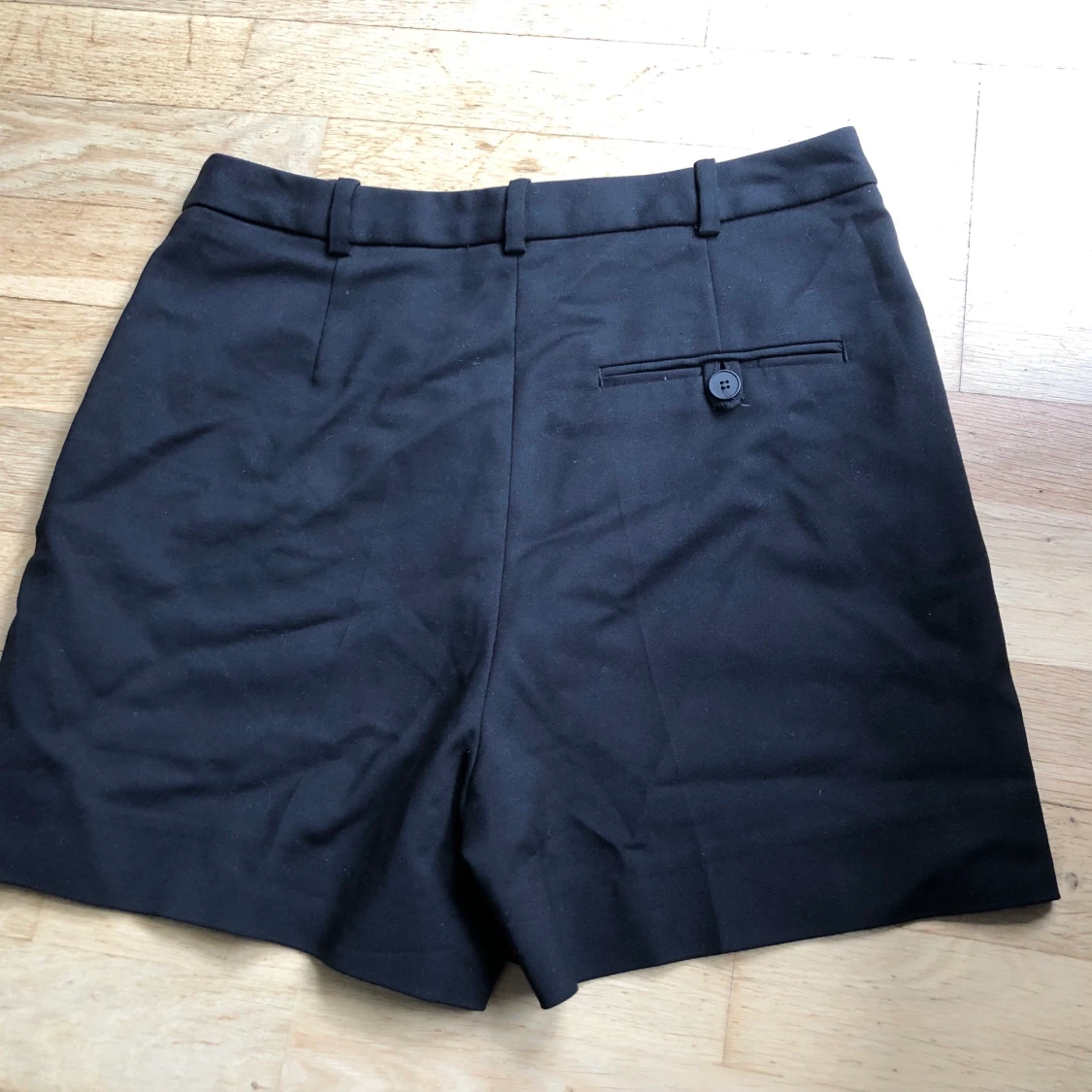 Svarta kostymshorts - 91