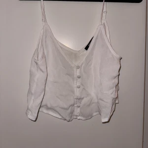 Linne - Vitt Lina från Gina tricot storlek 36.