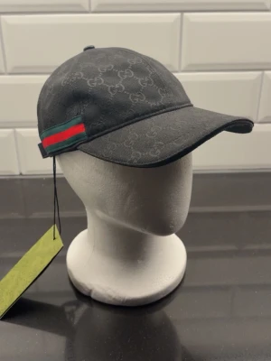 Svart keps  - ….r.