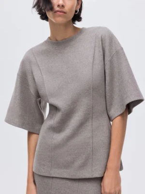 Finstickad topp med lös passform - Supersnygg tröja från H&M i en mullvadsgångar färg. Storlek S, oversize modell. Endast använd en gång, som ny.
