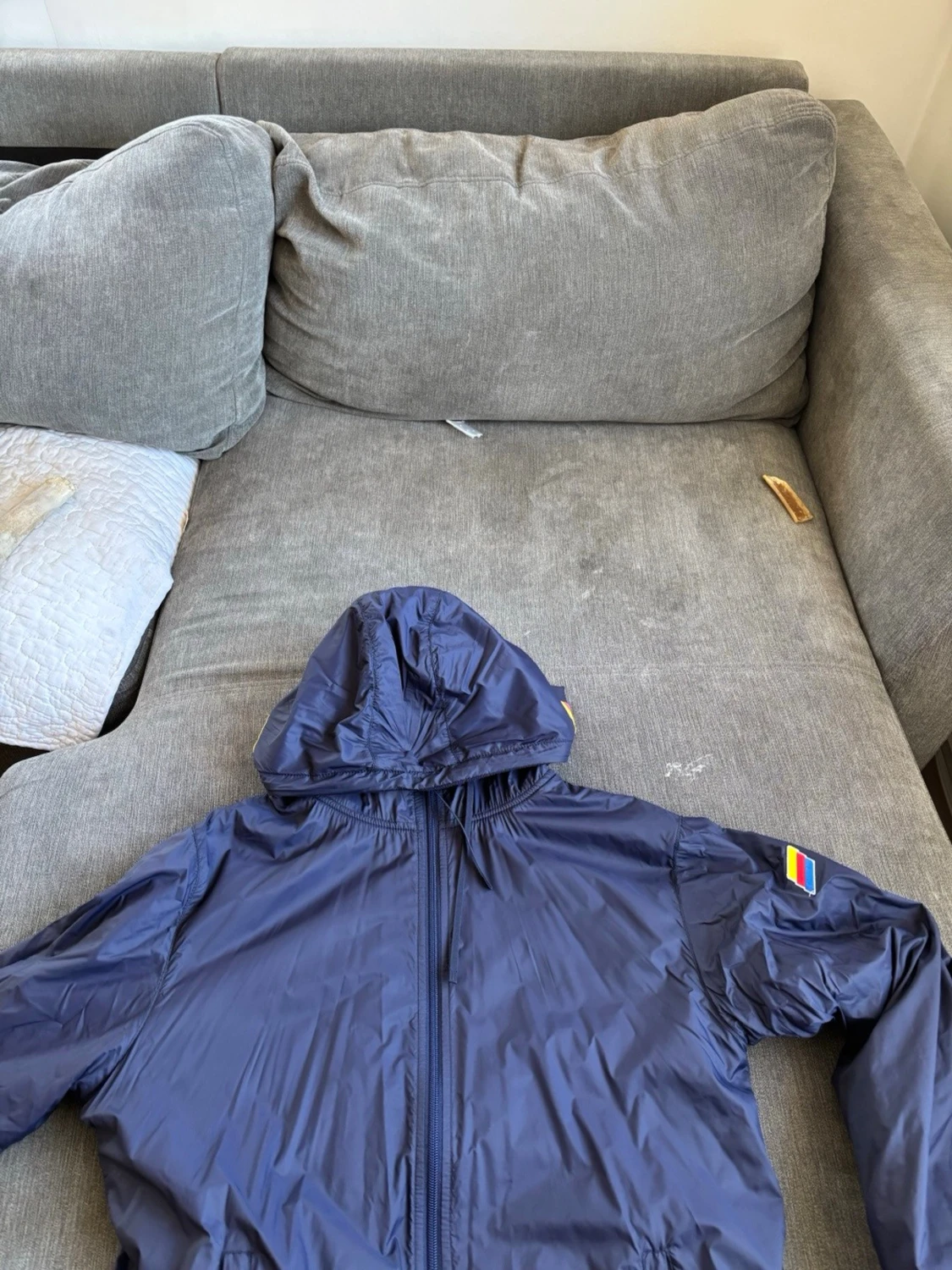 Blå vindjacka med huva från Djurgården 