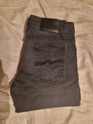 Nudie jeans - Svarta jeans från nudie. W-29/L-33