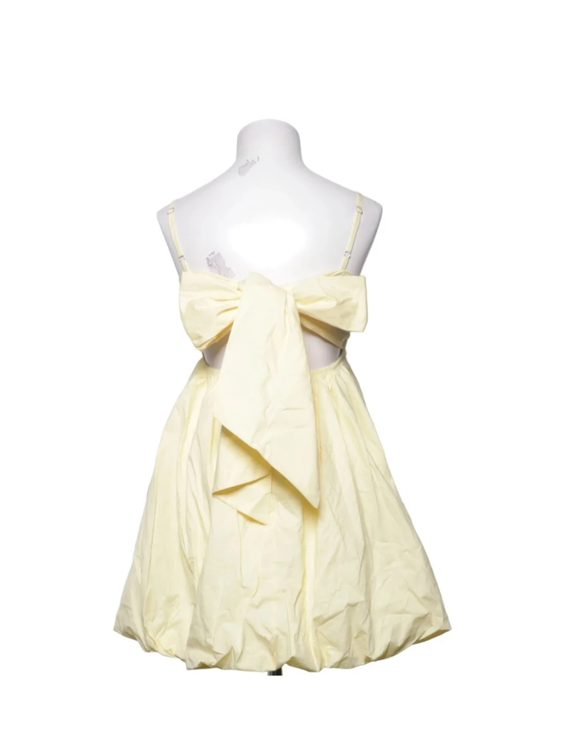 Ljusgul kort klänning med rosett