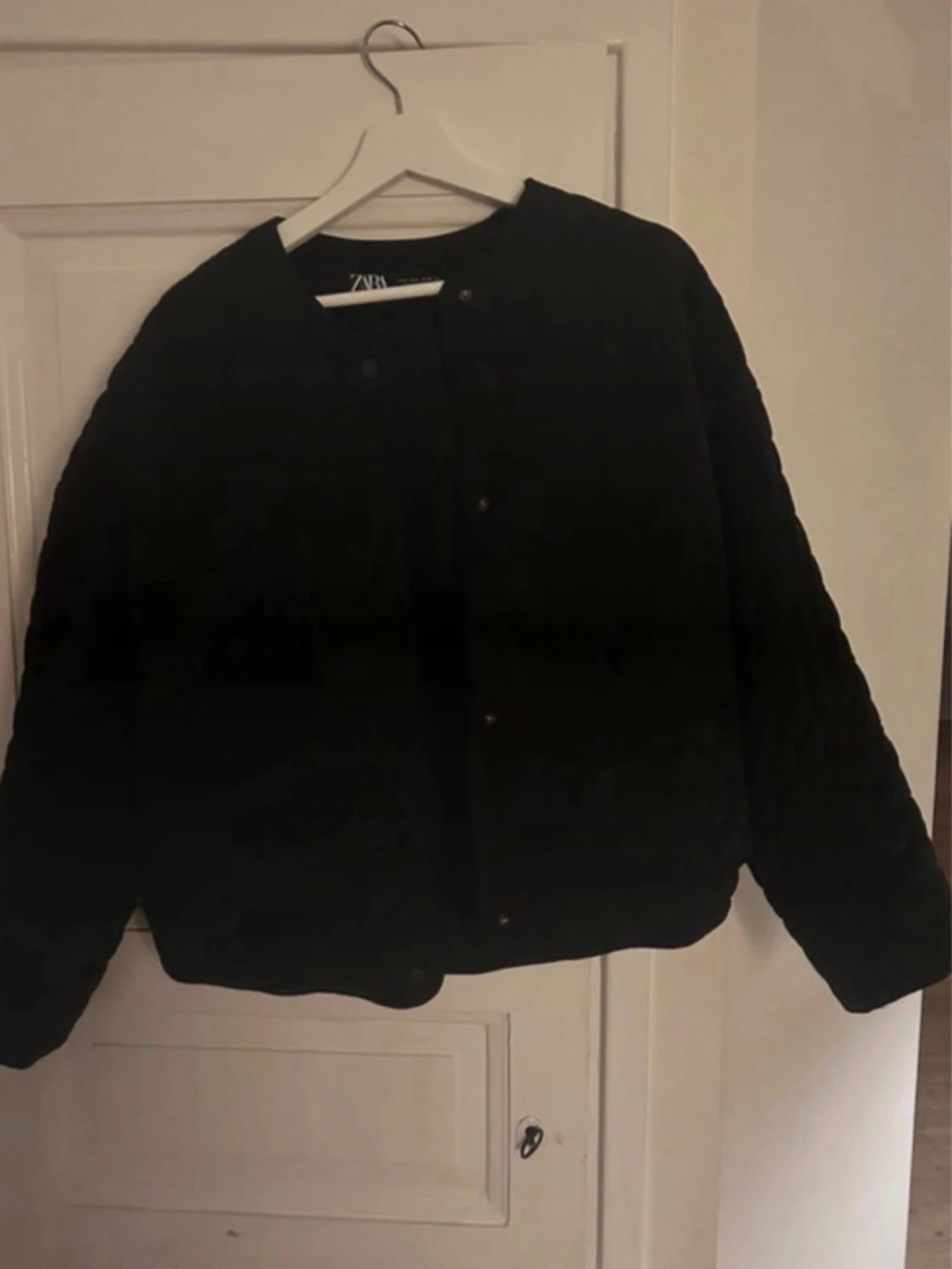 Svart dunjacka från Zara