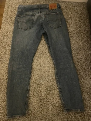 Levi’s jeans 502 - Levi’s jeans i bra skick storlek W33 L32