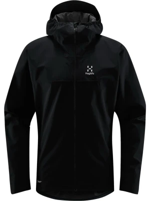 Svart regnjacka från Haglöfs | HAGLÖFS KORP PROOF - Säljer en svart regnjacka från Haglöfs med hel dragkedja och justerbar huva. Jackan har minimalistisk design, logotyp på bröstet och är tillverkad i ett vattenavvisande material som passar perfekt för regniga dagar.