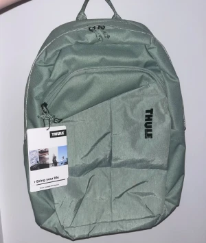Thule ryggsäck  - Thule Indago Backpack 23L i ljusgrön. Aldrig använd, lappen kvar. Kostar 1000 på Thules hemsida.