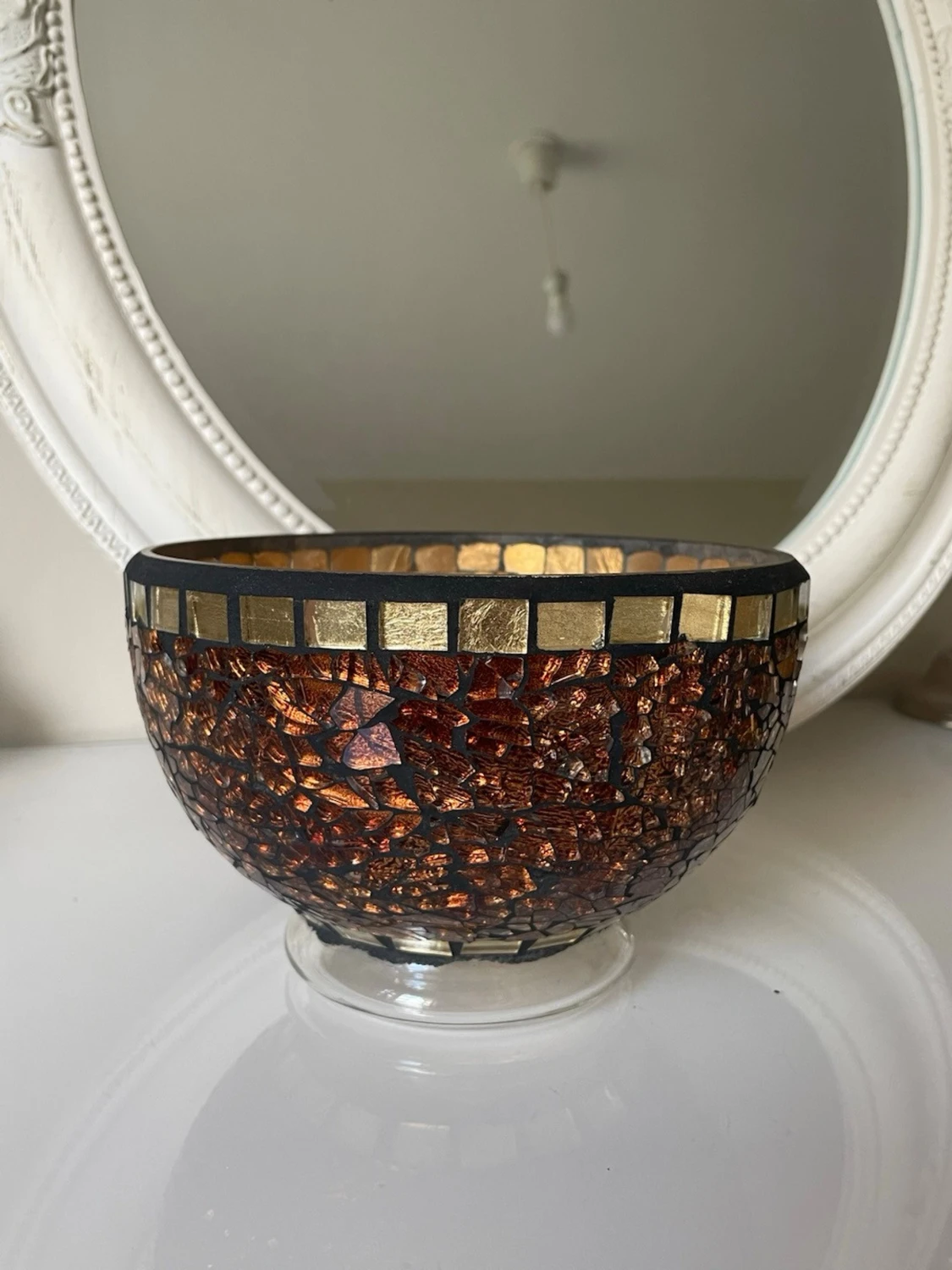 Mosaikskål med bruna och guld detaljer