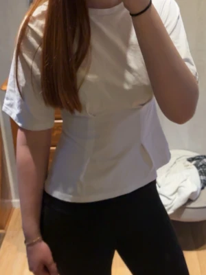  t-shirt med passform - T-shirt med passform från Nelly