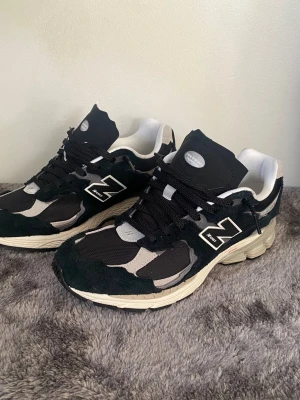 New Balance 2002R  - NB 2002R Protection Pack i väldigt fint skick då de endast använts 2 gånger. Pris kan diskuteras 