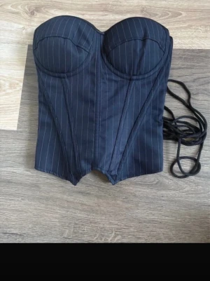 Korsett topp - Blå Korsett top, använd 2ggr. 