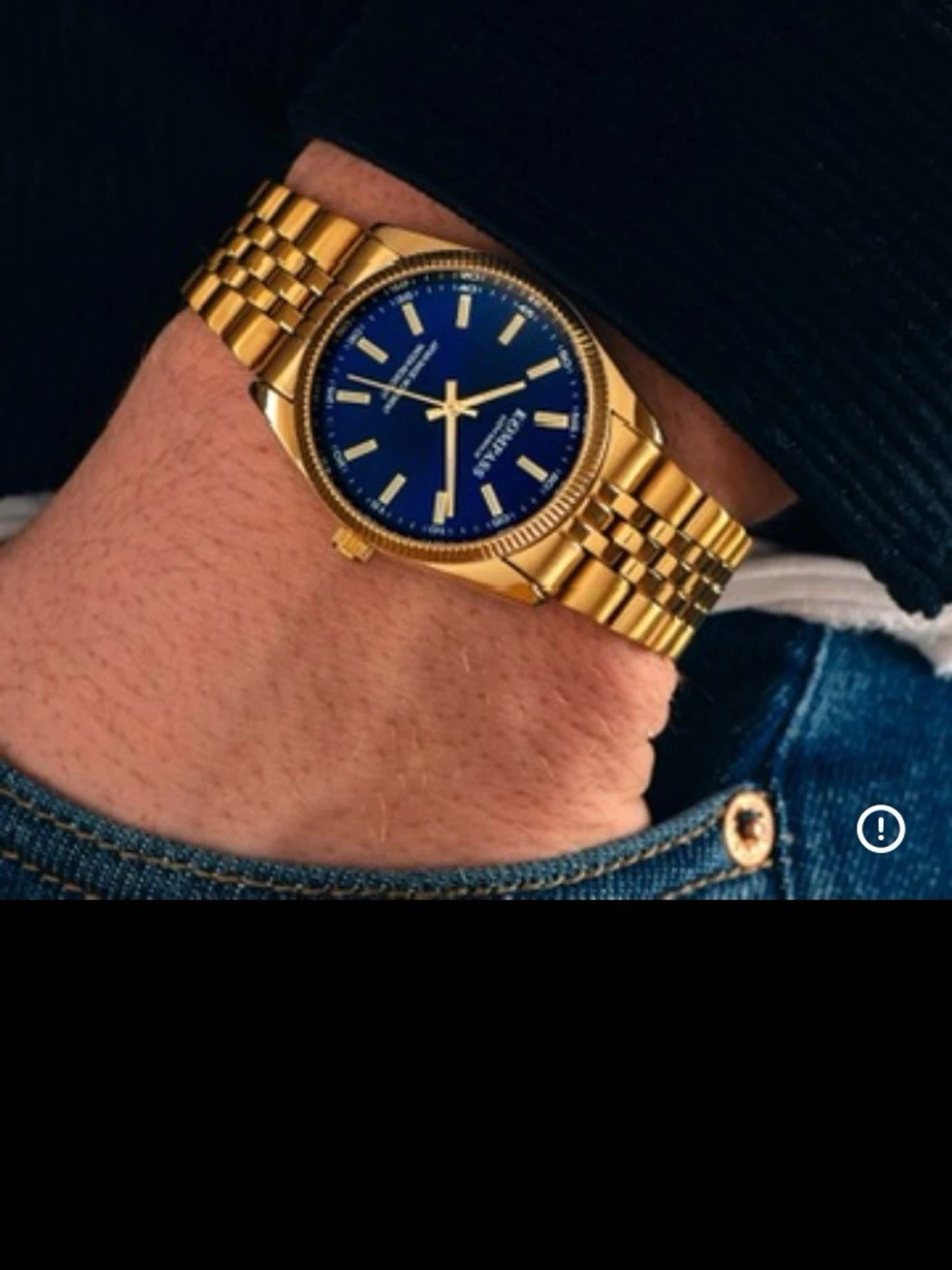 Guldig klocka med blå urtavla