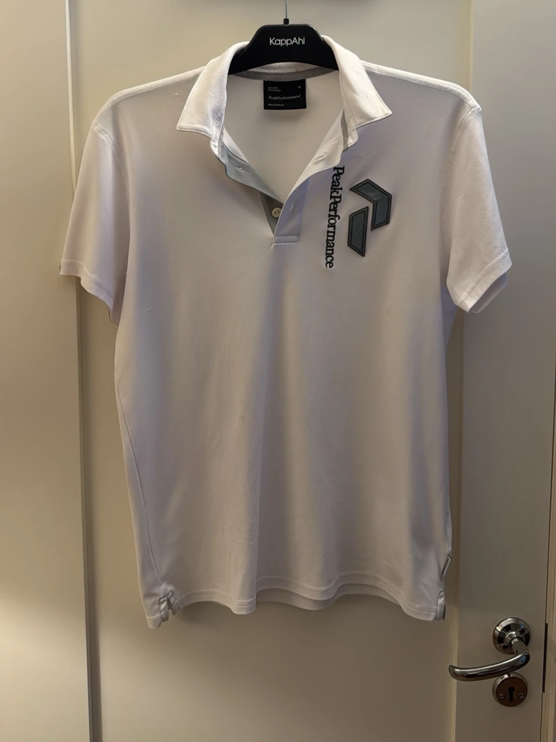 Vit pikétröja från Peak Performance