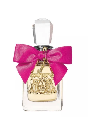 Juicy Couture parfym med rosa rosett - Juicy Couture parfym i en elegant glasflaska med en stor, klar kristalliknande kork. Flaskan pryds av en iögonfallande rosa rosett och ett guldfärgat emblem med texten 'couture' och dekorativa detaljer. Perfekt för dig som gillar lyxig och feminin design. Skriv för föer bilder