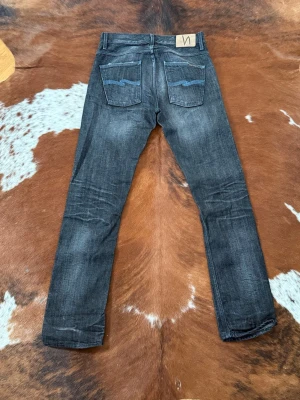 Selvage nudie grimtim - Tjena! Säljer dessa riktigt feta selvage nudie GrimTim, W30/L32, pris är fast men kan diskuteras vid köp av flera plagg, hör av dig vid funderingar!🙌