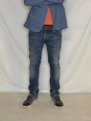 Nudie Jeans Grim Tim - Storlek: 33/32 Modell: Grim Tim. Väldigt bra skick