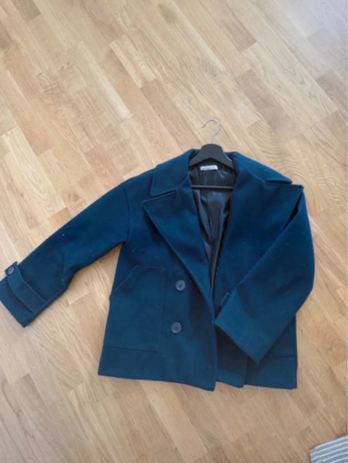 Mörkblå kappa från Design by si